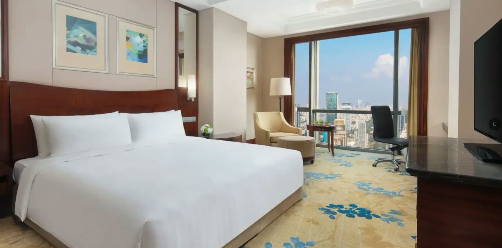 Guest room with floor-to-ceiling city views at Shangri-La Suzhou