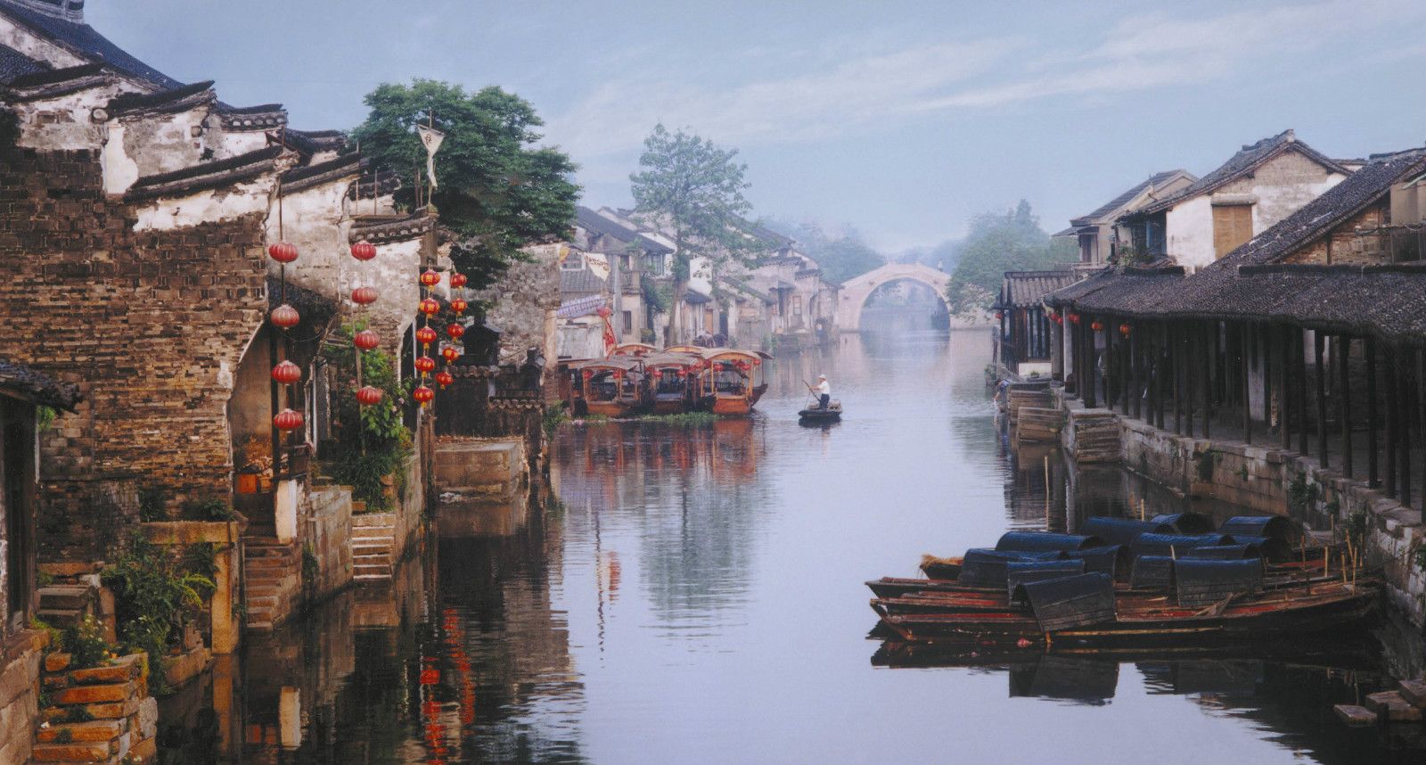 Lantern-lit canal and stone bridge at the Jiangnan water town of Wuzhen
