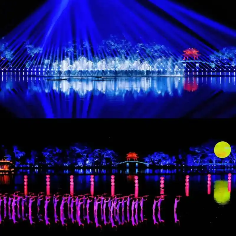 Lights and performers on the water at the Impression West Lake show, Hangzhou