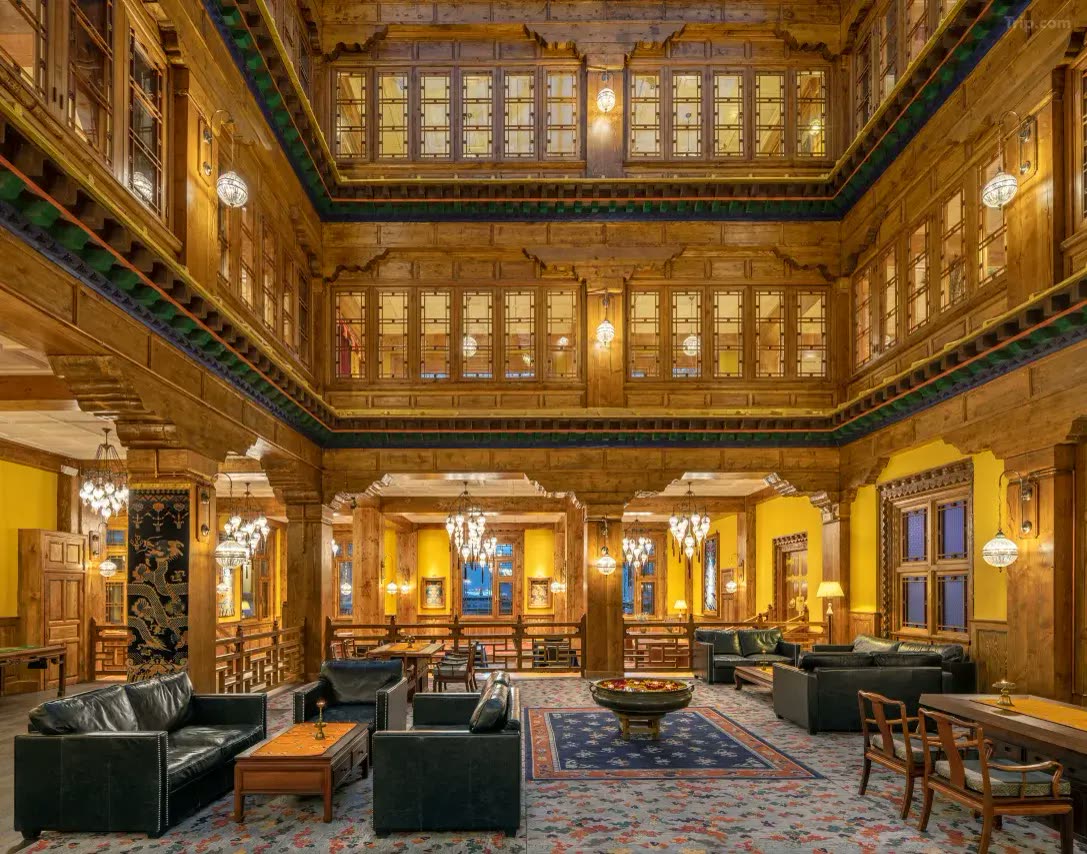Double-height timber atrium lounge at Songtsam Lhasa Linka