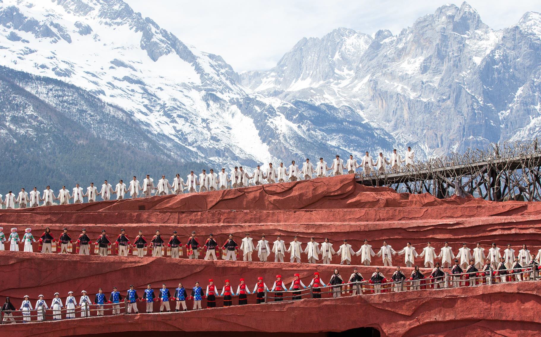 Impression Lijiang performers lined up before Jade Dragon Snow Mountain