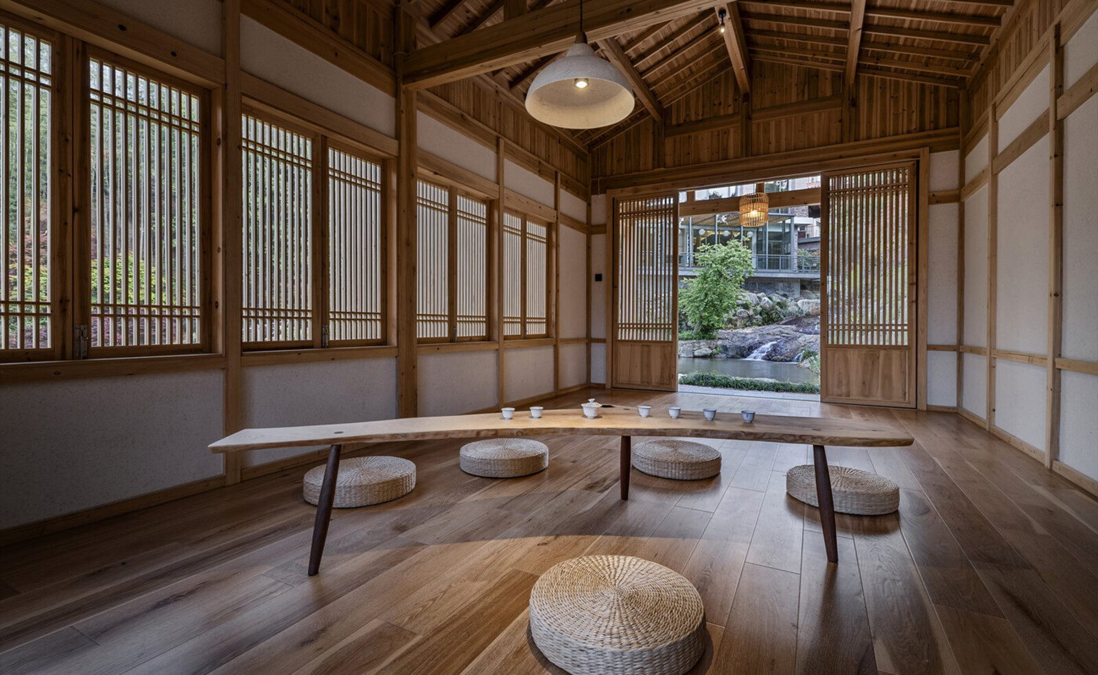 Timber tea lounge with garden view at Jiaye Mountain House