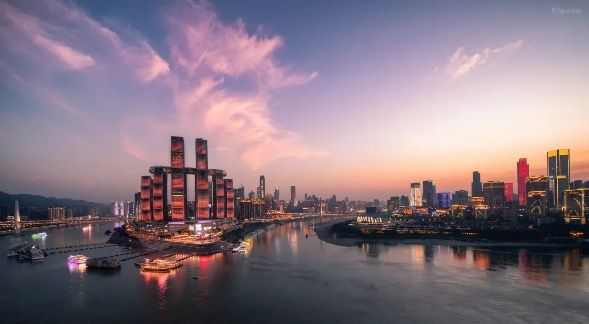 InterContinental Chongqing Raffles City towers at dusk over the Yangtze