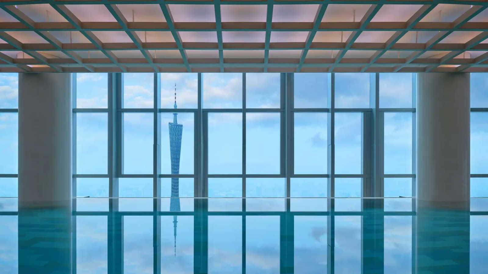 Indoor swimming pool with Canton Tower views at Park Hyatt Guangzhou