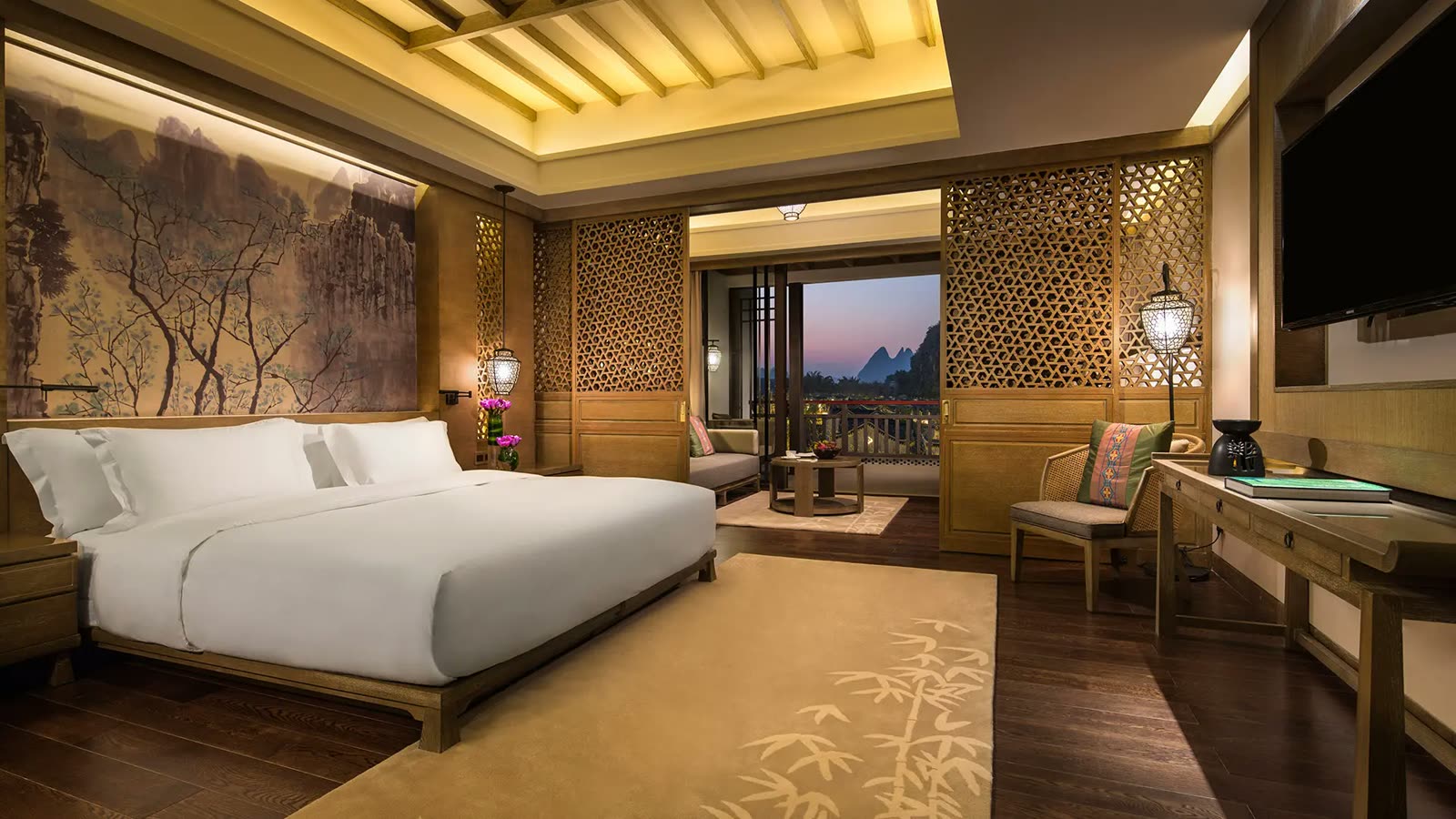 Karst Discovery Suite at Banyan Tree Yangshuo with a balcony facing the peaks